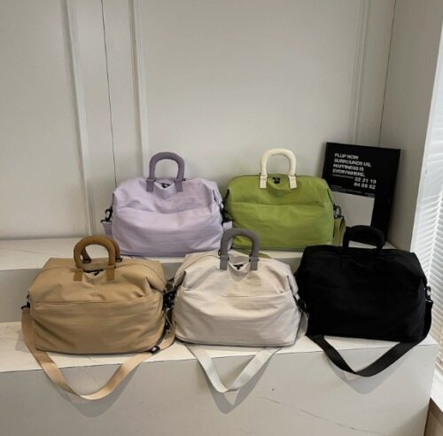 hero image beis weekender bag